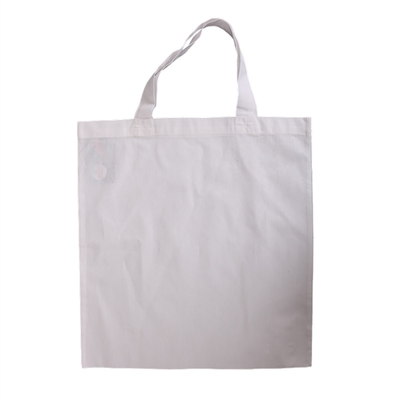 Nákupná taška s krátkym uškom je zhotovená zo 100% bavlny. Má bielu farbu. Možno ju ďalej dekorovať farbami na textil, batikovaním, linorytom na text