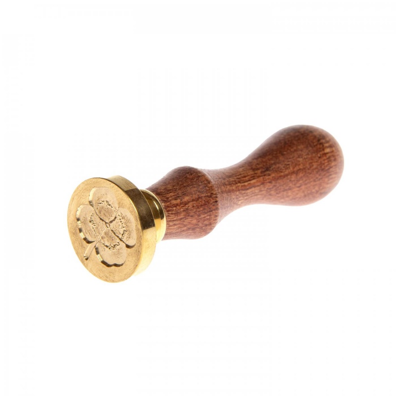 Pečatidlo s drevenou rúčkou sa používa pri tvorbe pečatí z pečatného vosku. Tvorba pečatí je stará vintage technika uzatvárania papierových obálo
